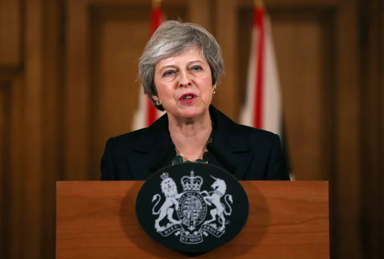 Theresa May: a primeira-ministra britânica enfrenta dificuldades para aprovar o projeto e manter o seu cargo (Ian Vogler/Reuters)