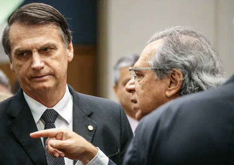O presidente e o futuro ministro Paulo Guedes: o “posto Ipiranga” terá de se mostrar capaz de pôr em prática as decisões econômicas do comando | Sergio Moraes/Reuters  (Sergio Moraes/Reuters)