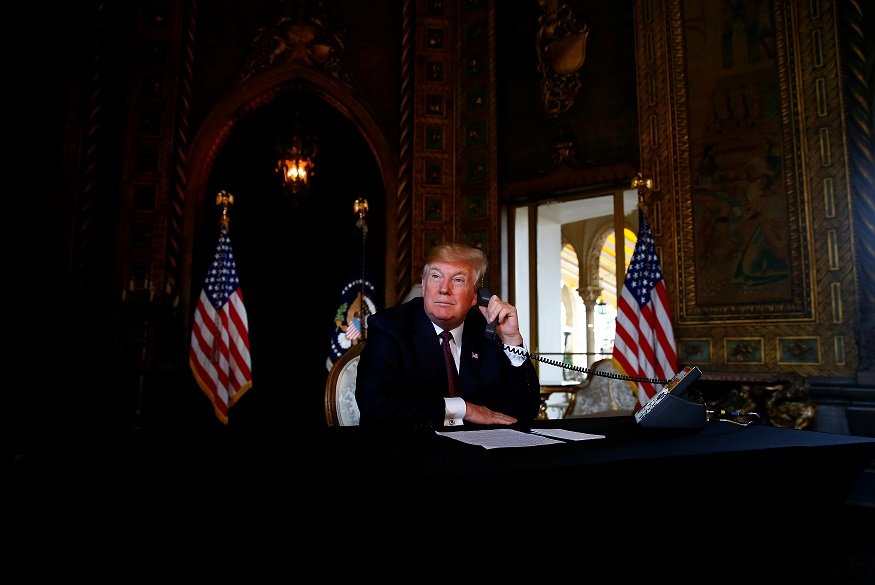 U.S. President Donald Trump speaks via video teleconference with troops from Mar-a-Lago estate in Palm Beach