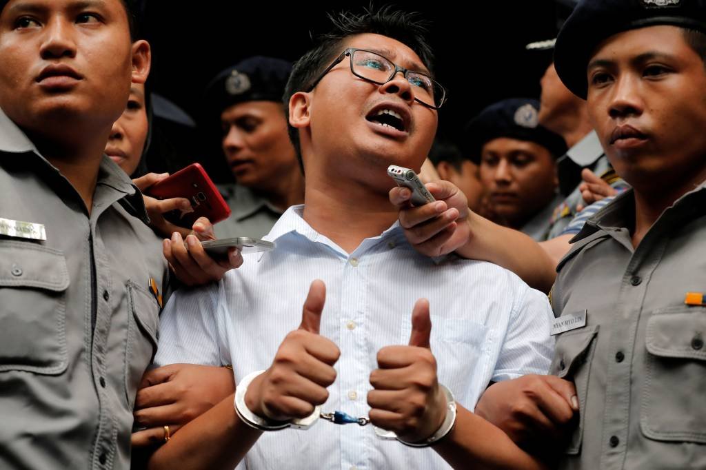 Jornalistas mortos e presos são eleitos "pessoa do ano" pela Time: pelo 3ª ano consecutivo mais da metade estão na Turquia, na China e no Egito (Reuters/Myat Thu Kyaw)