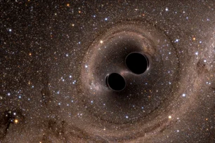 Imagem referente à matéria: Colisão intensa entre buracos negros gera estrutura 225 vezes maior que o Sol