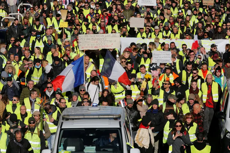 "Coletes amarelos" protestam na França: nova estratégia conseguiu despistar a polícia (Reuters/Reuters)