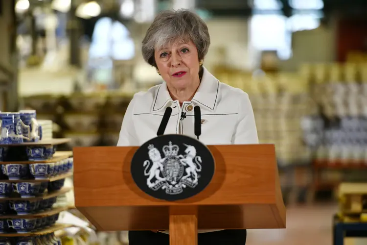 May: O "backstop" tem sido o principal entrave para a aprovação do acordo de Brexit (Ben Birchall/Reuters)