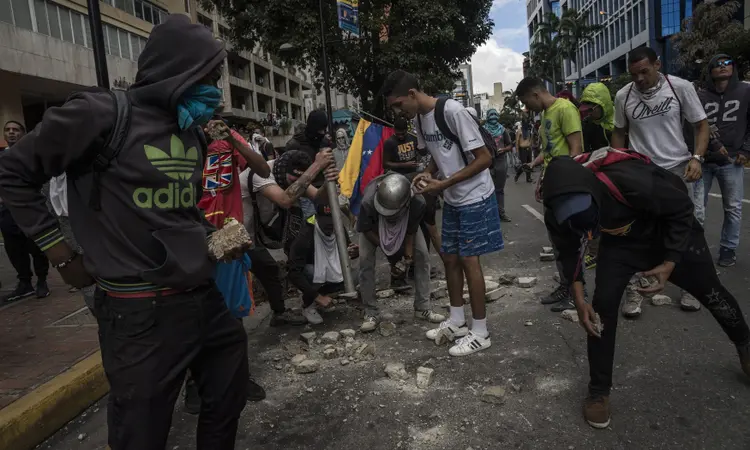 Venezuela: 13 pessoas já foram mortas durante os protestos contra o governo Maduro (Anadolu Agency/Getty Images)