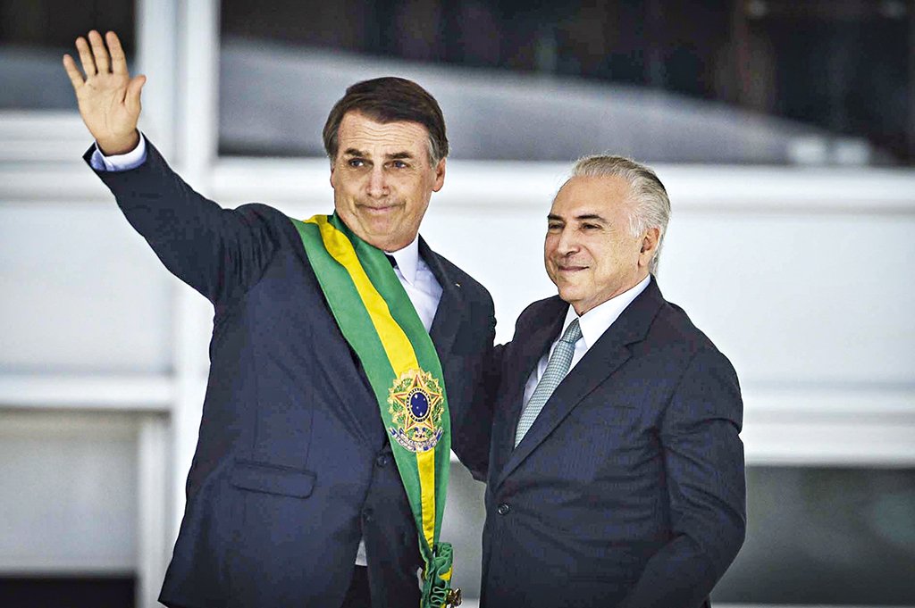 Jair Bolsonaro e Temer na posse do atual presidente, em janeiro de 2019: segundo Temer, o presidente Bolsonaro tem "sorte" pela atuação "vibrante" do Congresso (Marcelo Camargo/Agência Brasil)