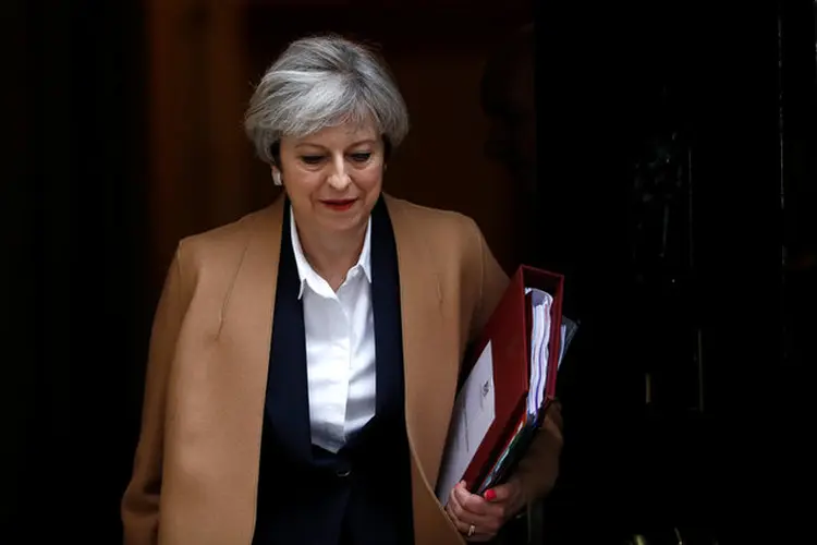Theresa May: após derrota histórica da primeira-ministra do Reino Unido no Parlamento britânico por conta do brexit, governo enfraquece (Stefan Wermuth/Reuters)