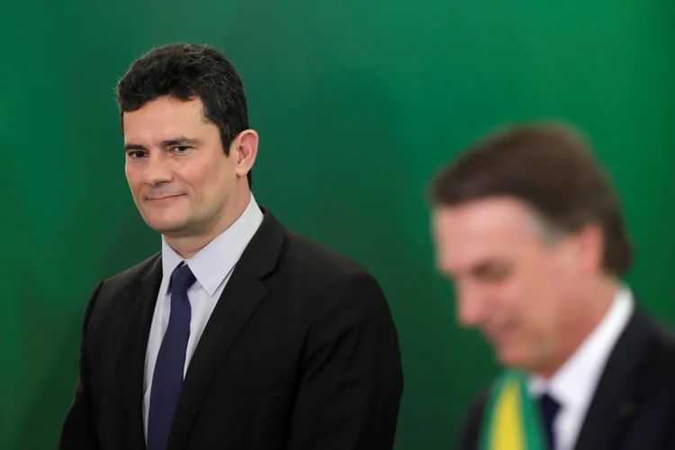 Sérgio Moro e Jair Bolsonaro: "Às vezes me pergunto: meu Deus, o que fiz para merecer isso? É só problema", brincou o presidente (Ueslei Marcelino/Reuters)