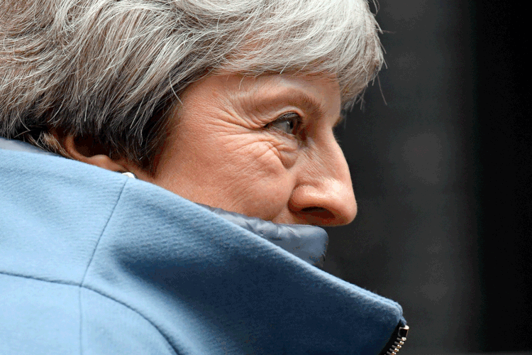 Theresa May: Primeira ministra foi derrotada no parlamento com 230 votos de diferença (Toby Melville/Reuters)