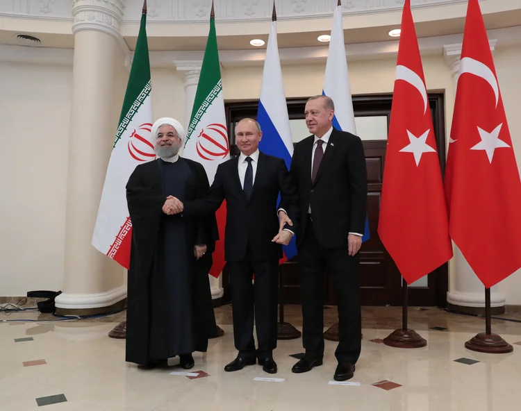 Presidente do Irã, Hassan Rohani, presidente da Rússia, Vladimir Putin,e o presidente da Turquia, Tayyip Erdogan (Murat Cetinmuhurdar/Turkish Presidential Press Office/Reuters)