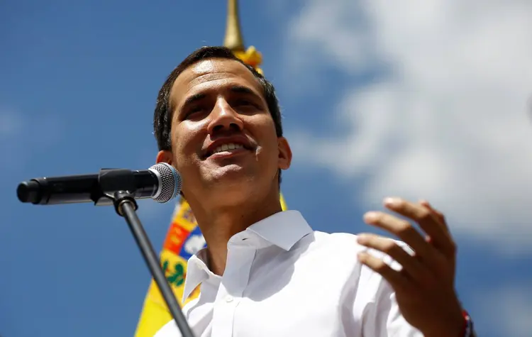 Juan Guaidó: o autoproclamado presidente da Venezuela diz que deve voltar ao país para enfrentar a ditadura de Maduro (Marco Bello/Reuters)