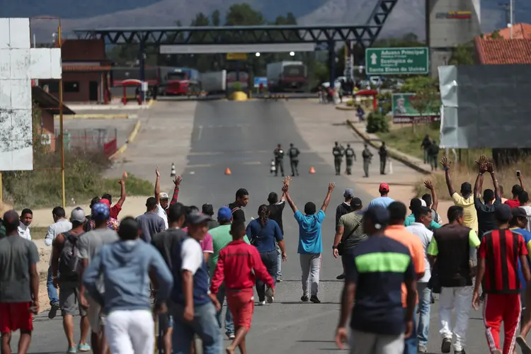 People react at the border between Venezuela and Brazil in Pacaraima, Roraima state, Brazil, February 22, 2019. REUTERS/Ricardo Moraes (Ricardo Moraes/Reuters)