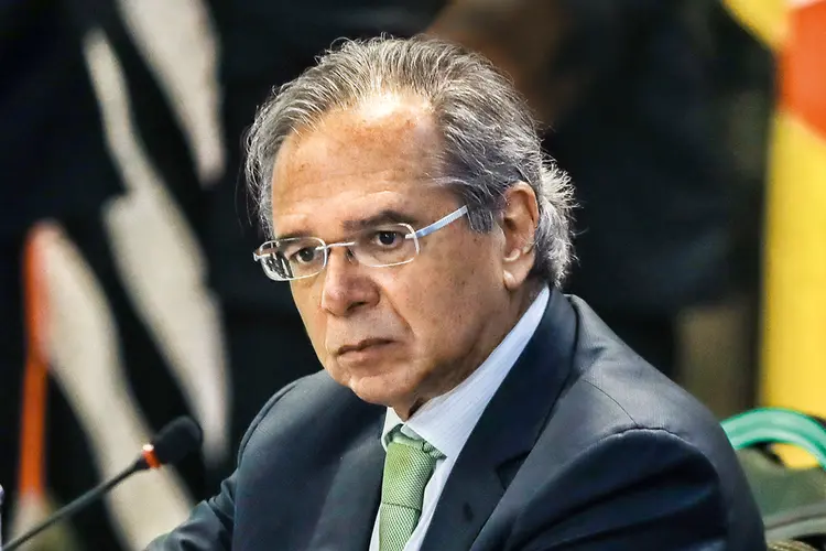 Paulo Guedes: deputados do Centrão ameaçam não comparecer a encontro com o ministro na terça-feira (26) (Sergio Lima/AFP)