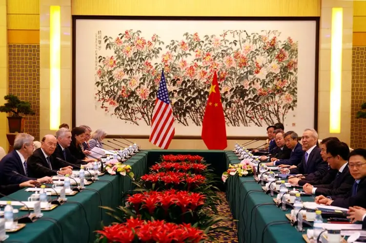 CHINA E EUA: encontro em Washington entre hoje e amanhã pode estender o prazo de trégua ou até confirmar um acordo definitivo  / Andy Wong/Pool via REUTERS (Andy Wong/Pool/Reuters)