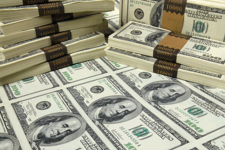 Dólar caía ante o real no pregão desta segunda-feira (25) (Don Farrall/Getty Images)