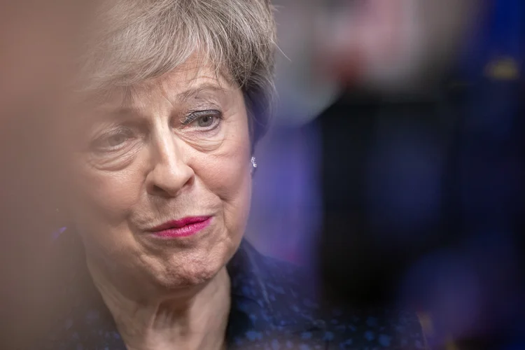 Theresa May: Primeira ministra britânica recuou sobre saída de Londres da UE (Olivier Matthys/Getty Images)