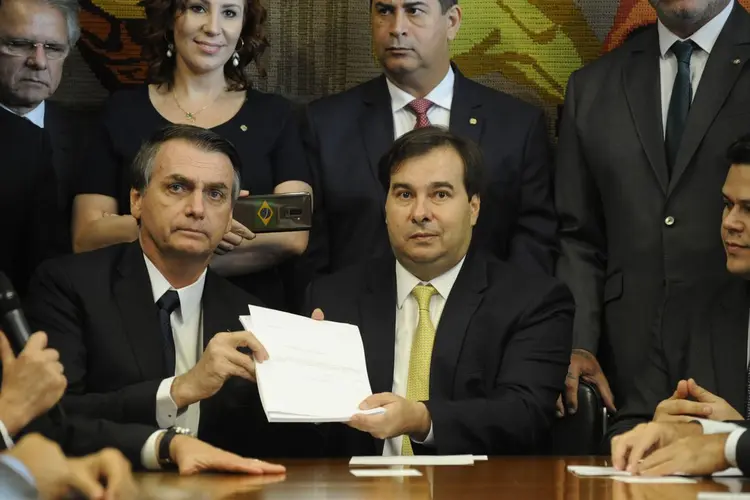 Presidente da Câmara dos Deputados, dep. Rodrigo Maia, recebe o Presidente da República, Jair Bolsonaro: atrito entre poderes ameaça reforma (Luis Macedo/Agência Brasil)