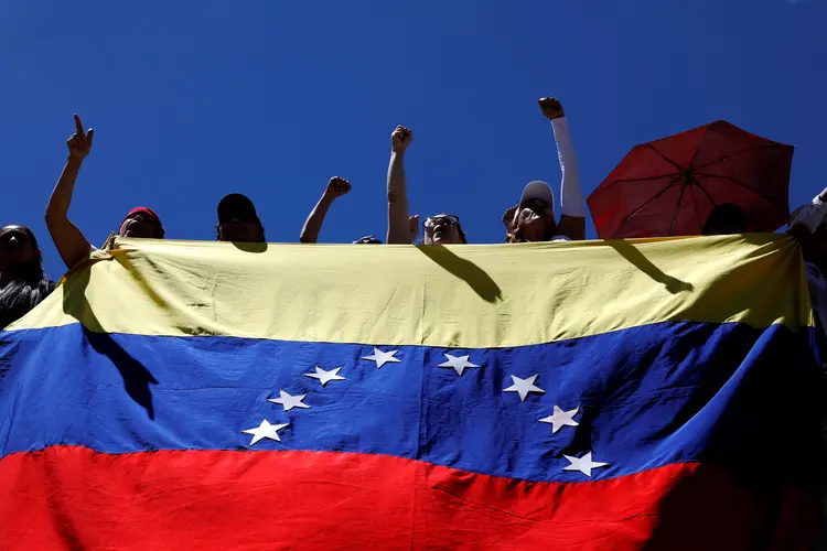 Supporters of the Venezuelan opposition leader Juan Guaido, who many nations have recognized as the country's rightful interim ruler, take part in a rally to demand President Nicolas Maduro to allow humanitarian aid to enter the country, in Caracas, Venezuela February 23, 2019. REUTERS/Carlos Jasso (Carlos Jasso/Reuters)