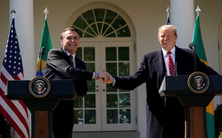 Bolsonaro e Trump: apoio americano à entrada do Brasil na Otan ocorreu durante encontro entre os presidentes, no dia 19 de março (Kevin Lamarque/Reuters)