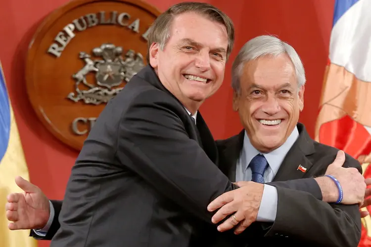 Jair Bolsonaro e Sebastian Piñera: "amizade permanente", disse presidente chileno (Rodrigo Garrido/Reuters)