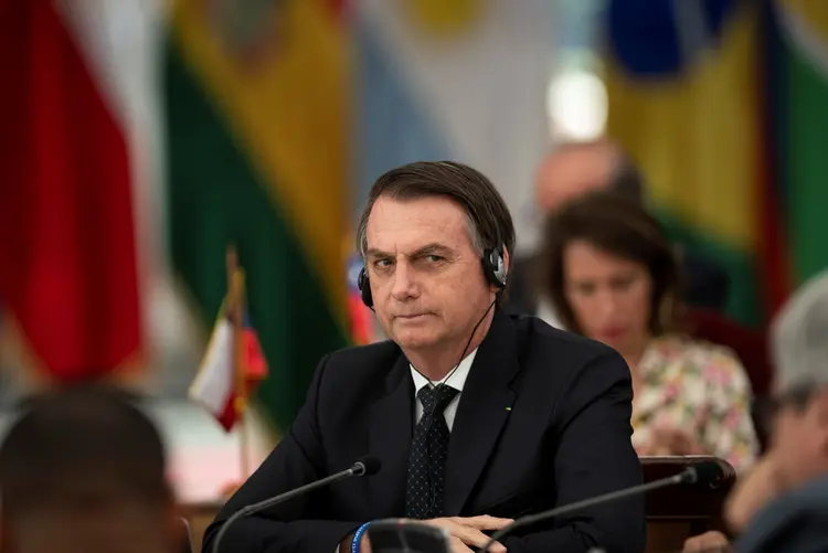 Bolsonaro durante viagem ao Chile (Courtesy of Chilean Presidency/Handout/Reuters)