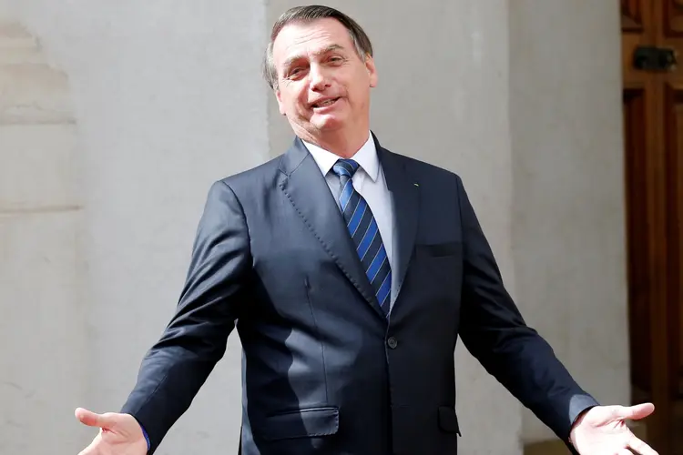 Bolsonaro no Chile: presidente se encontrou com empresários na manhã deste sábado (23) (Rodrigo Garrido/Reuters)