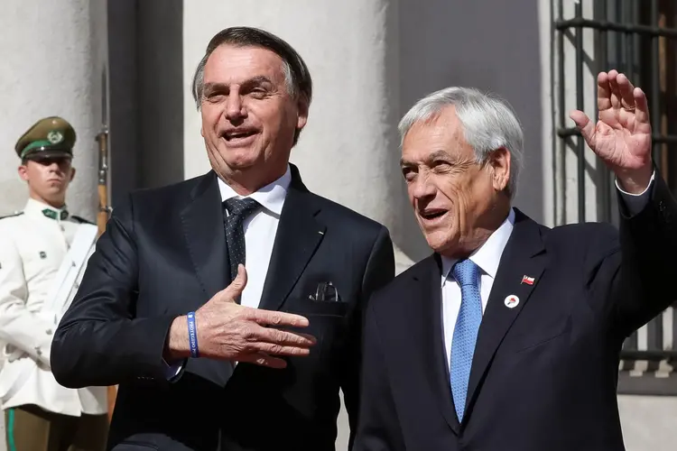O presidente do Brasil, Jair Bolsonaro, e o presidente do chileno, Sebástian Piñera, durante Cúpula Presidencial de Integração Sul-Americana, em Santiago, no Chile. (Marcos Corrêa/P/Agência Brasil)