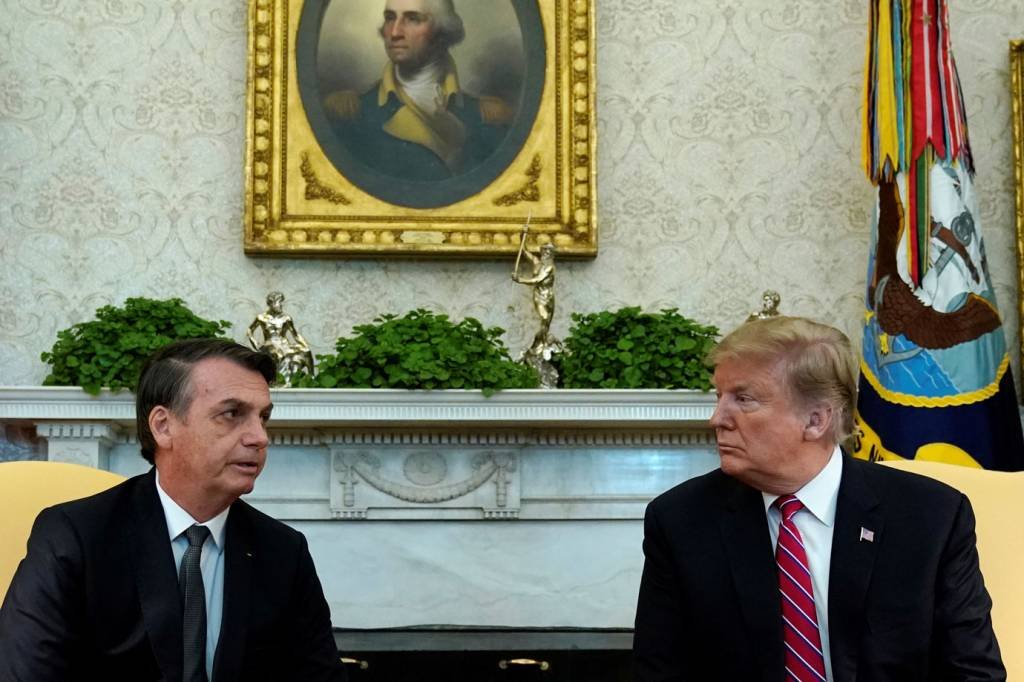 Bolsonaro e Trump: Brasil na OCDE foi um dos tópicos do encontro entre os presidentes (Kevin Lamarque/Reuters)