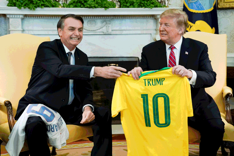 Jair Bolsonaro e Donald Trump: planos do governo dos EUA, depois de ter dito anteriormente que queria que a Argentina, é uma vitória para a administração do presidente Jair Bolsonaro (Kevin Lamarque/Reuters)
