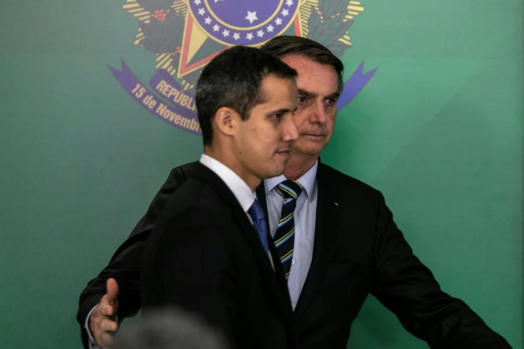 Juan Guaidó e Jair Bolsonaro no Palácio do Planalto (-/AFP)