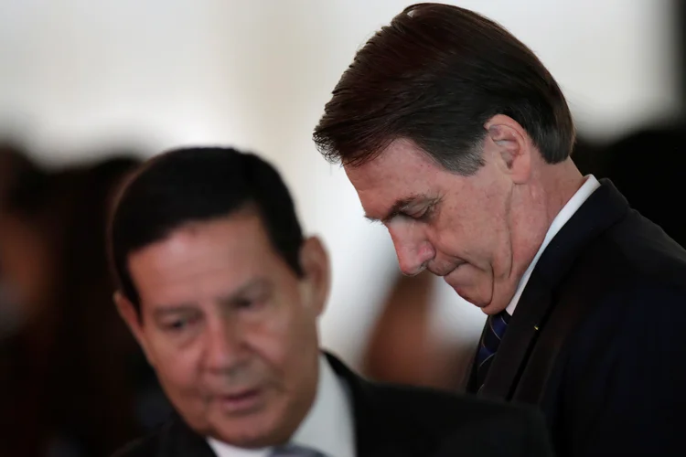 Morão e Bolsonaro: governo em sido criticado por entidades nacionais e internacionais por conta de números alarmantes sobre o avanço do desmatamento na região. (Ueslei Marcelino/Reuters)