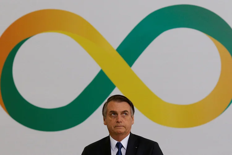 Bolsonaro: não é a primeira vez que um fotógrafo registra o momento em que um presidente não consegue cumprimentar uma criança (Adriano Machado/Reuters)