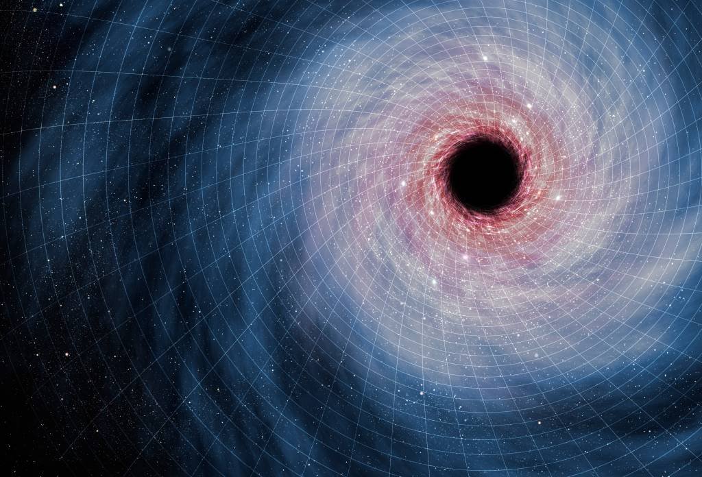 Buraco Negro: cientistas acham que descobriram um dos maiores buracos negros registrados, que é tão gigantesco que distorce a luz de galáxias próximas.  (MARK GARLICK/SCIENCE PHOTO LIBRARY/Getty Images)