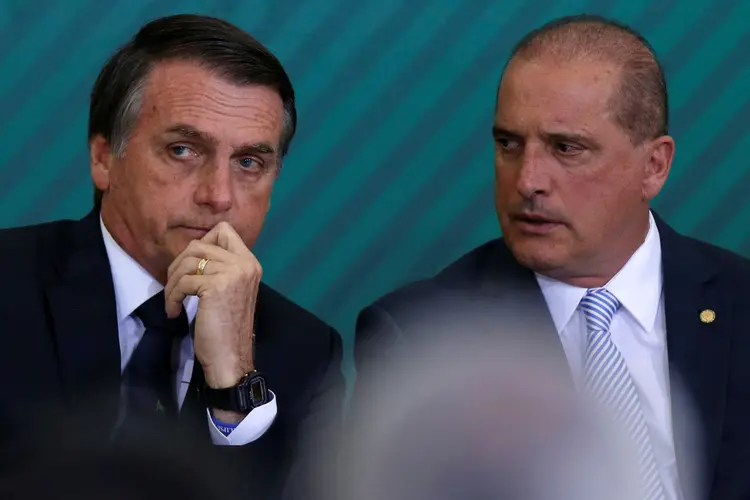 Jair Bolsonaro e Onyx Lorenzoni: ministro da Casa Civil disse que população não quer mais "toma lá, da cá" (Adriano Machado/Reuters)