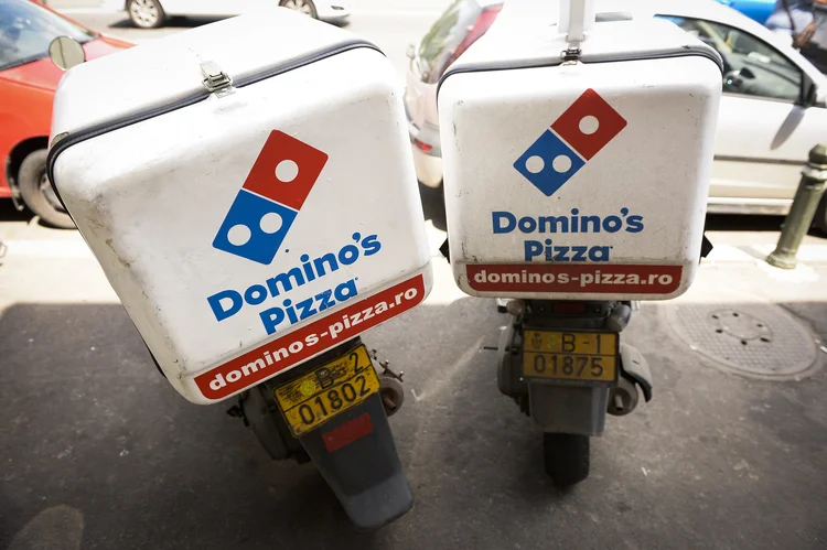 Domino's: a marca pretende se tornar uma rede mais paulista, e menos fluminense (NurPhoto / Contributor/Getty Images)