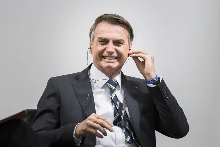 Jair Bolsonaro: conversa foi captada segundos antes de entrevista com   jornalistas de veículos estrangeiros. (Florian Gaertner/Photothek/Getty Images)