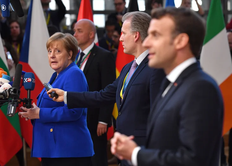 Merkel declarou apoio ao alemão de centro-direita Manfred Weber, enquanto Macron citou outros três nomes (Leon Neal/Getty Images)