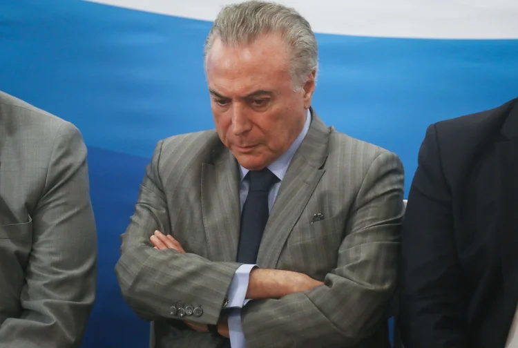 Temer: a condução de Temer deve ser feita pela Polícia Federal e ele deve usar algemas (Mario Tama/Getty Images)