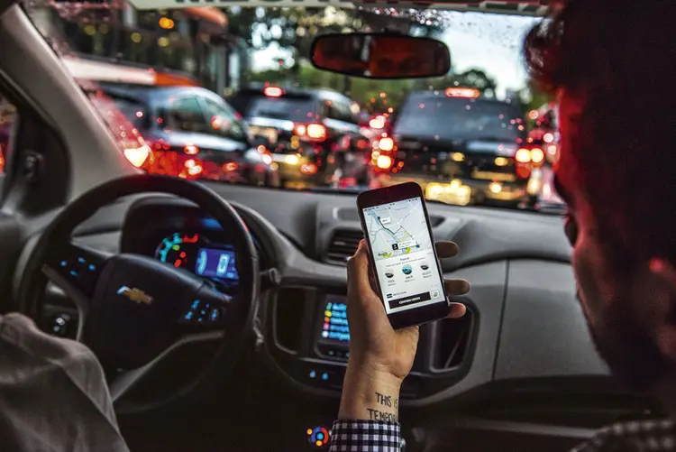 Passageiro da Uber em São Paulo: a empresa faturou 11 bilhões de dólares em 2018, mas ainda perde muito dinheiro (Germano Lüders/Exame)