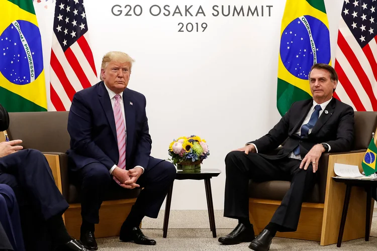 Encontro: Donald Trump e Jair Bolsonaro se reúnem durante a cúpula do G20, em Osaka, no Japão, e falam sobre reformas econômicas brasileiras e um possível acordo de livre comércio entre Brasil e Estados Unidos (Alan Santos/Presidência da República/Reprodução)