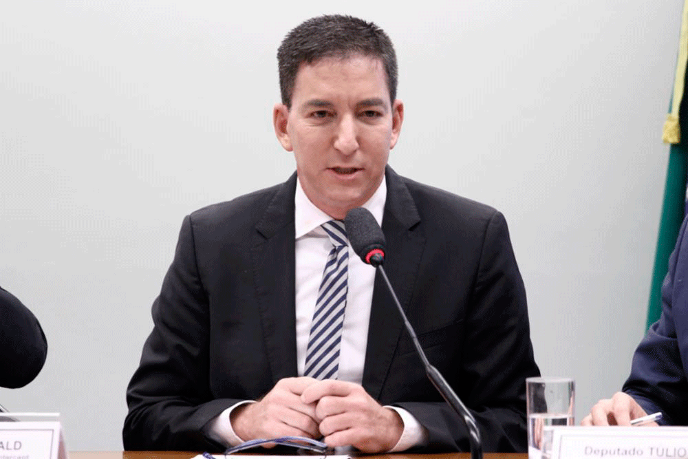 Glenn Greenwald: apesar de não ser investigado pela Polícia Federal, jornalista foi denunciado pelo Ministério Público (Vinicius Loures/Câmara dos Deputados/Agência Câmara)