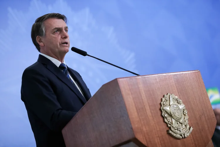 Jair Bolsonaro vem se posicionando a favor de regras mais brandas de transição para os policiais (Marcos Corrêa/PR/Flickr)