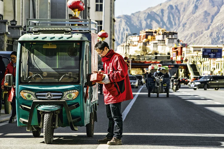 Delivery na China: governo definiu como meta para o avanço do PIB o intervalo entre 6% e 6,5% (China Stringer Network/Reuters)