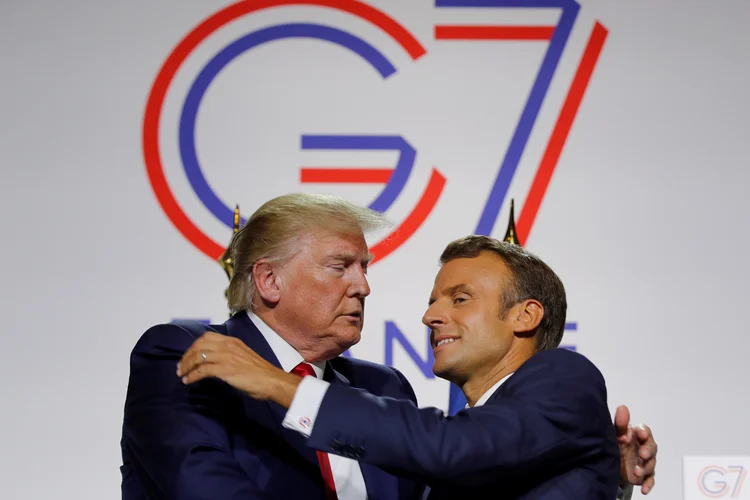 Donald Trump e Emmanuel Macron na cúpula do G7: comunicado conjunto tocou em temas urgentes, mas não trouxe ações específicas para o meio ambiente (Philippe Wojazer/Reuters)