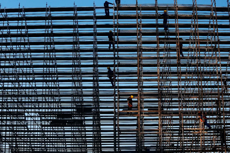 Construção civil (Mario Tama/Getty Images)