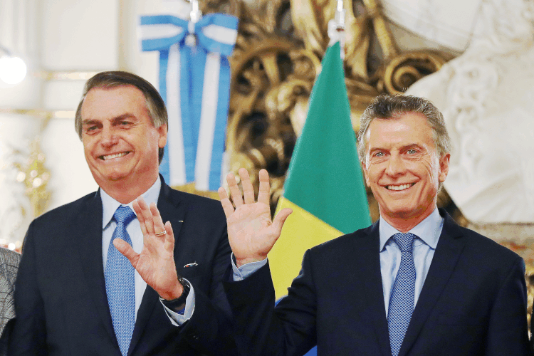 Bolsonaro e Macri: presidente do Brasil afirma que mesmo que Macri perca a eleição, a Argentina deve seguir com a mesma política comercial (Agustin Marcarian/Reuters)