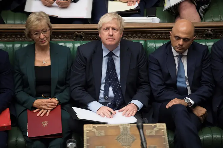 Boris Johnson: numa sessão especial do Parlamento, os legisladores votaram, por 322 votos a 306, para suspender a aprovação do acordo Brexit até que a legislação para implementá-lo seja aprovada. (Jessica Taylor/Reuters)