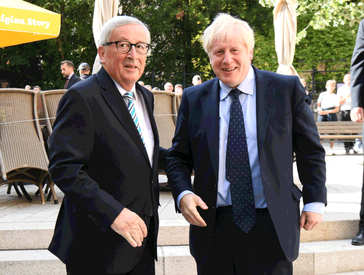 Primeiro-ministro do Reino Unido, Boris Johnson, e chefe da Comissão Europeia, Jean-Claude Juncker: negociações de acordo para o Brexit pouco avançaram (Stefan Rousseau - PA Images/Getty Images)