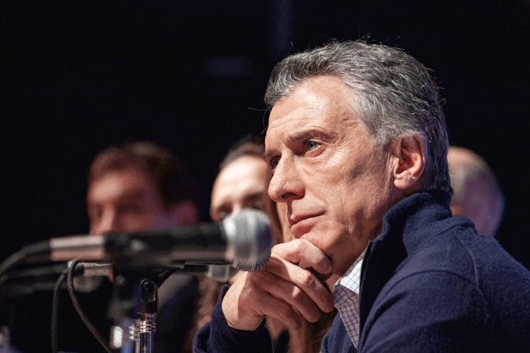 Mauricio Macri: Desde que a oposição obteve vitória esmagadora sobre o presidente argentino, as reservas internacionais do país caíram 22% (Erica Canepa/Bloomberg)