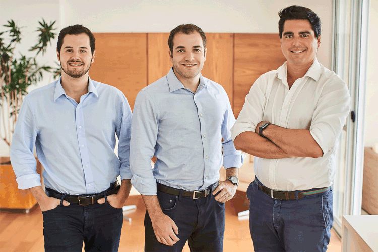 Murilo Bassora, Daniel Gomes e Nicolas Arellaga, cofundadores da Nexoos (Nexoos/Divulgação)