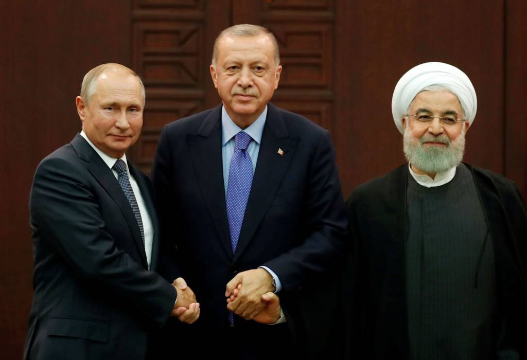 Vladimir Putin, Erdogan e Houssain Houhani: Kremlin vem trabalhando duro para colocar a Rússia como uma alternativa aos EUA na região (Sputnik/Alexei Nikolsky/Kremlin/Reuters)